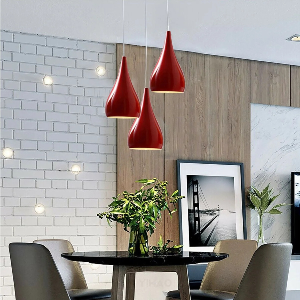 3 head pendant light in white metal with black shades, hanging from ceiling on a 95cm cable.