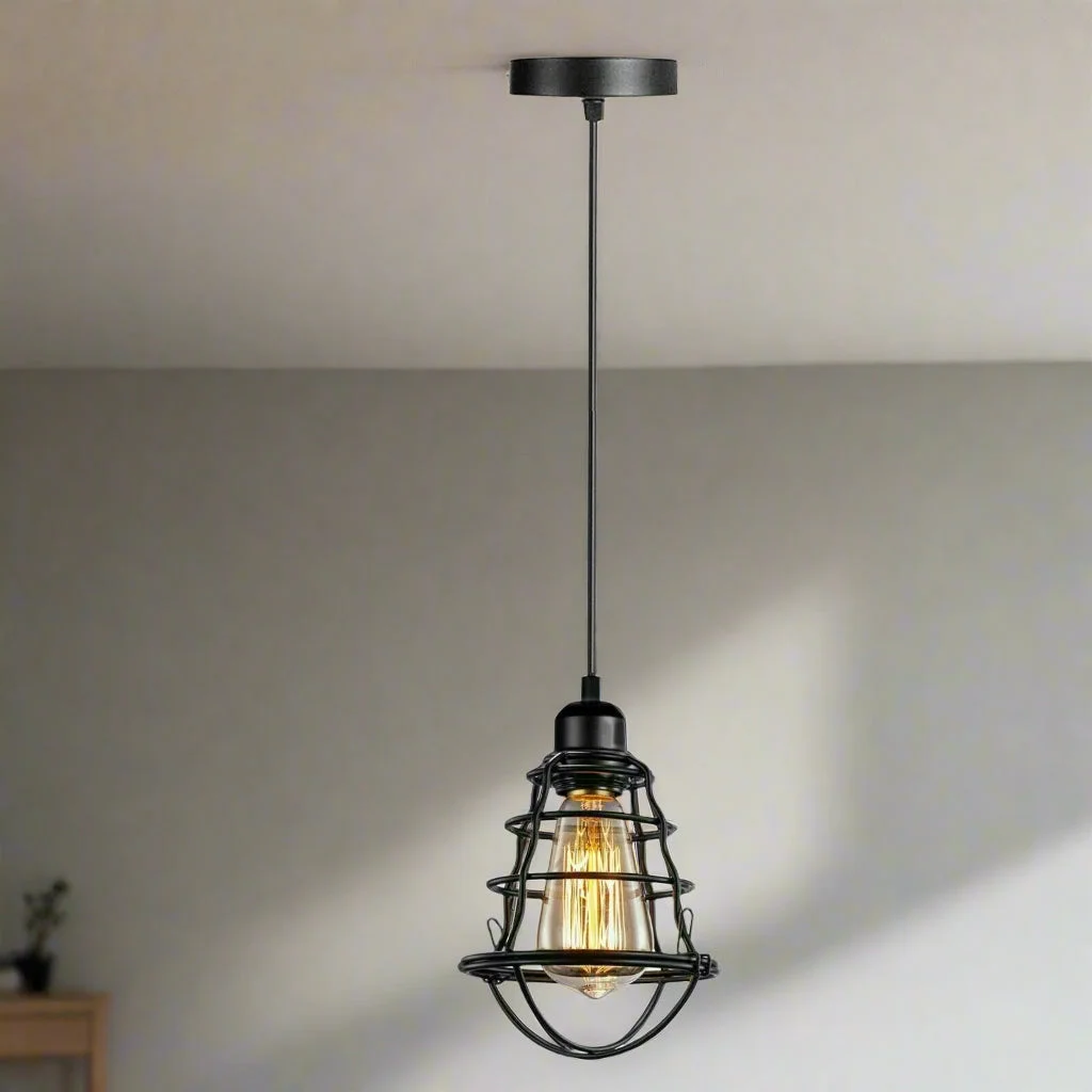 black cage pendant light with matte black metal cage, adjustable 95 cm cord, hanging from ceiling