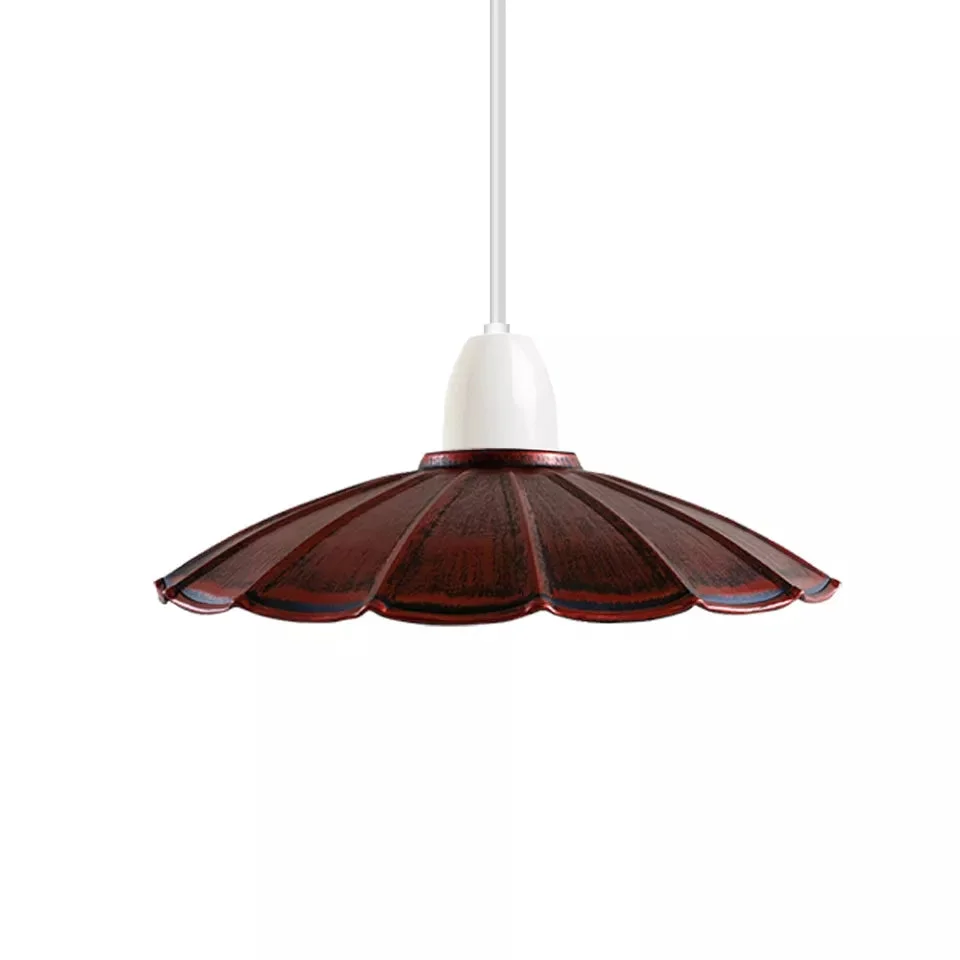 Sturdy metal lamp shade hanging from ceiling, brushed copper finish, easy fit ceiling shade for living rooms.