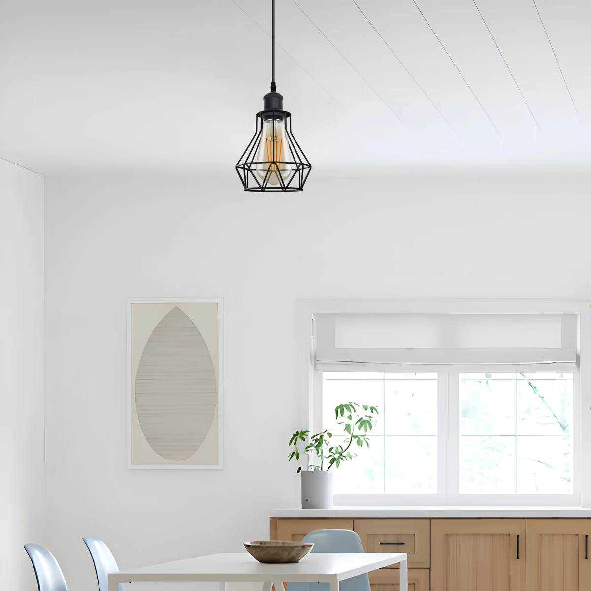 Black metal E27 pendant light fitting with 95cm PVC cable and round ceiling plate, surrounded by lighting accessories