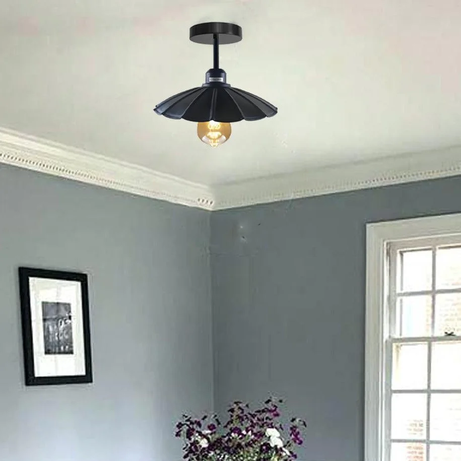 Modern metal ceiling pendant lamp as an E27 ceiling light, black and brushed silver hues, cylindrical 10cm shade.