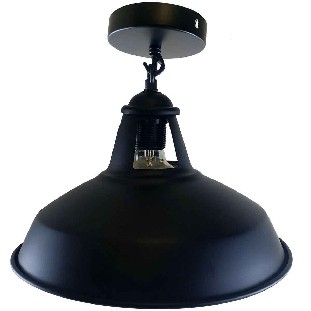 Industrial metal pendant light in black, featuring a 30cm wide metal shade, standard E27 base, hanging from a ceiling rose.