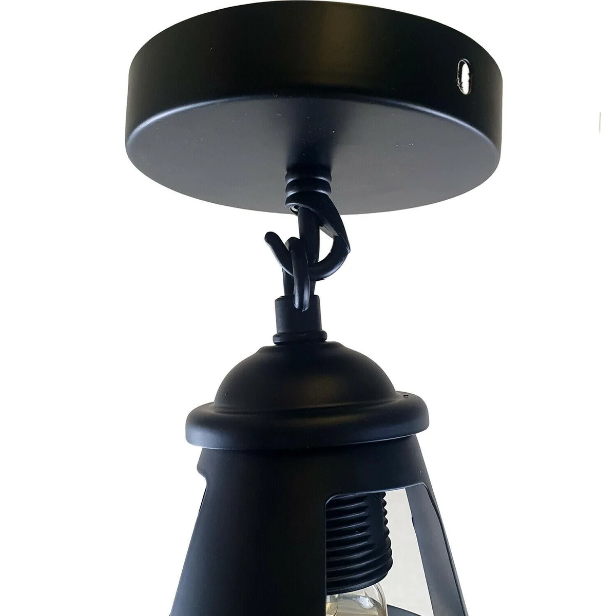 Industrial metal pendant light with a 30cm wide glass dome shade hanging from a ceiling rose, finished in metal.