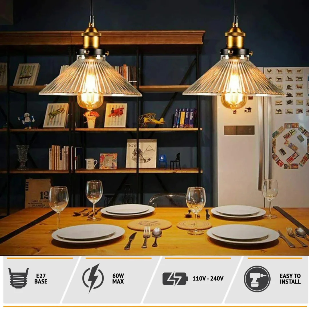 Glass pendant lamp with amber glass shade, metal base, 25 cm diameter shade, hanging on 95 cm PVC cable.