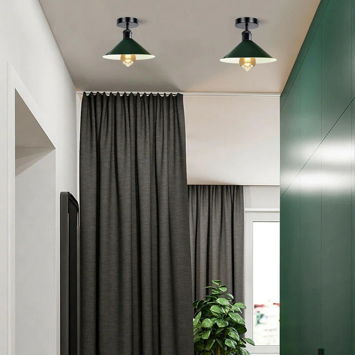 Metal cone pendant light with shiny black holder, white cone shade, LED‑compatible.