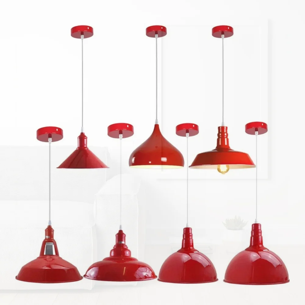 Red ceiling pendant light hanging over kitchen island, angled metal and PVC hood, 100mm plate, 95cm wire.