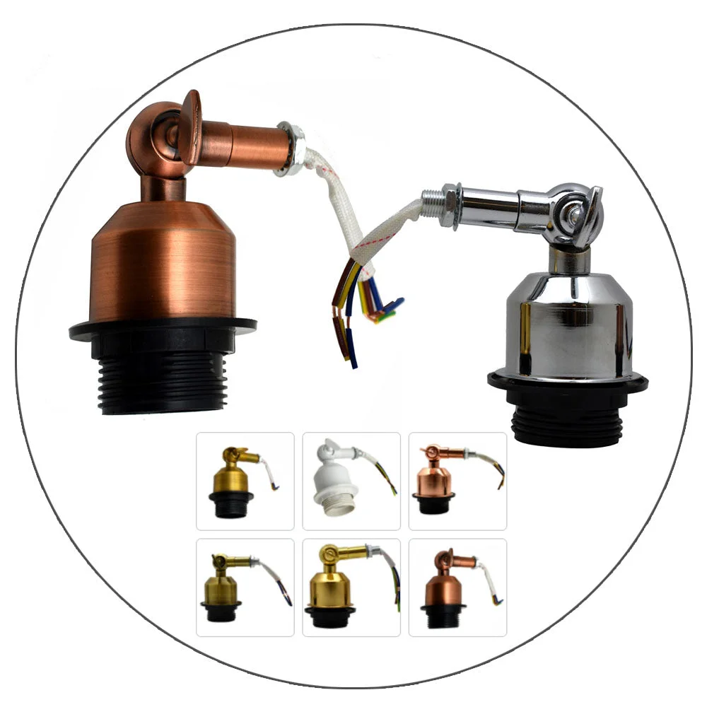 Chrome and rose gold bedroom wall lights with metal arm design and warm glow