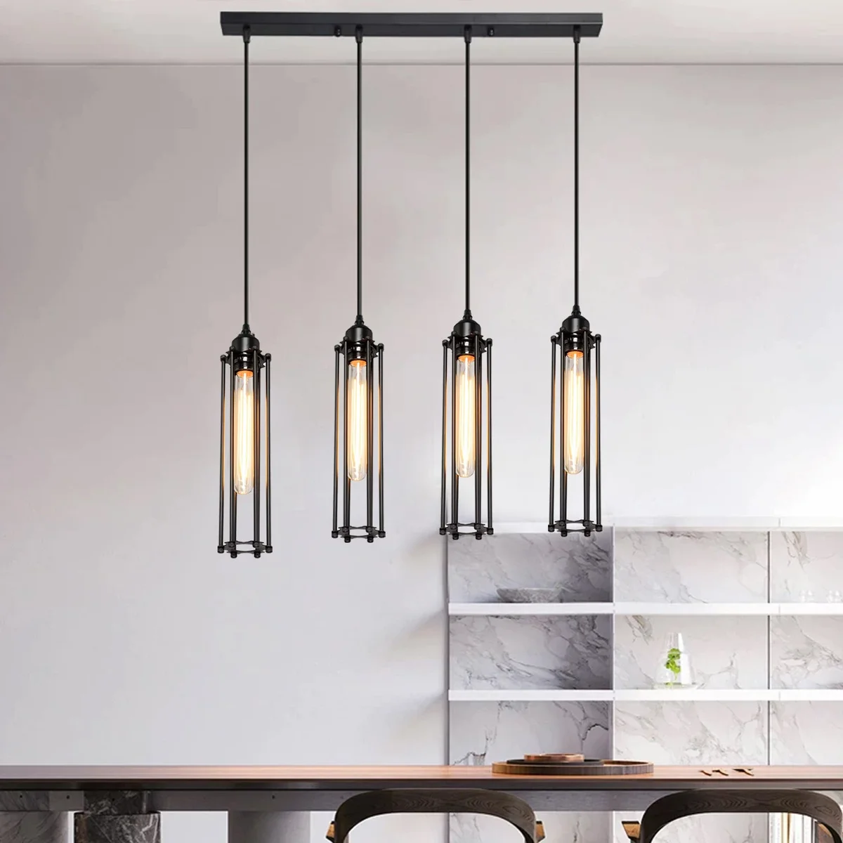 Black cage ceiling light with four E27 clear glass bulbs suspended by 95 cm cable, open metal cage, stylish industrial fixture.