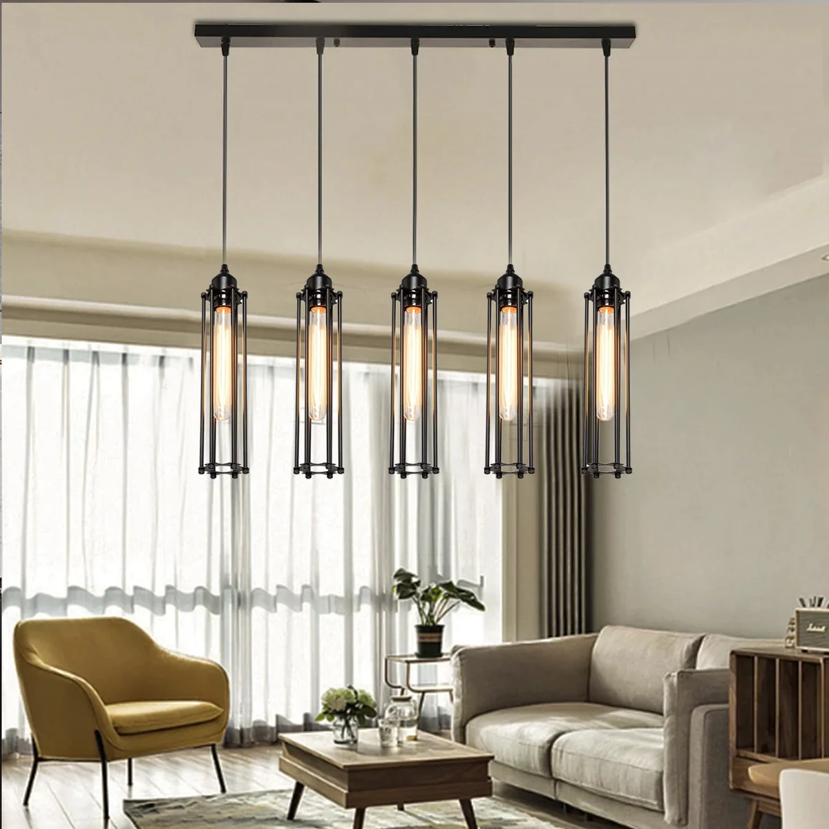 adjustable pendant light with black metal cage and 95cm PVC cable, five lamp holders behind.
