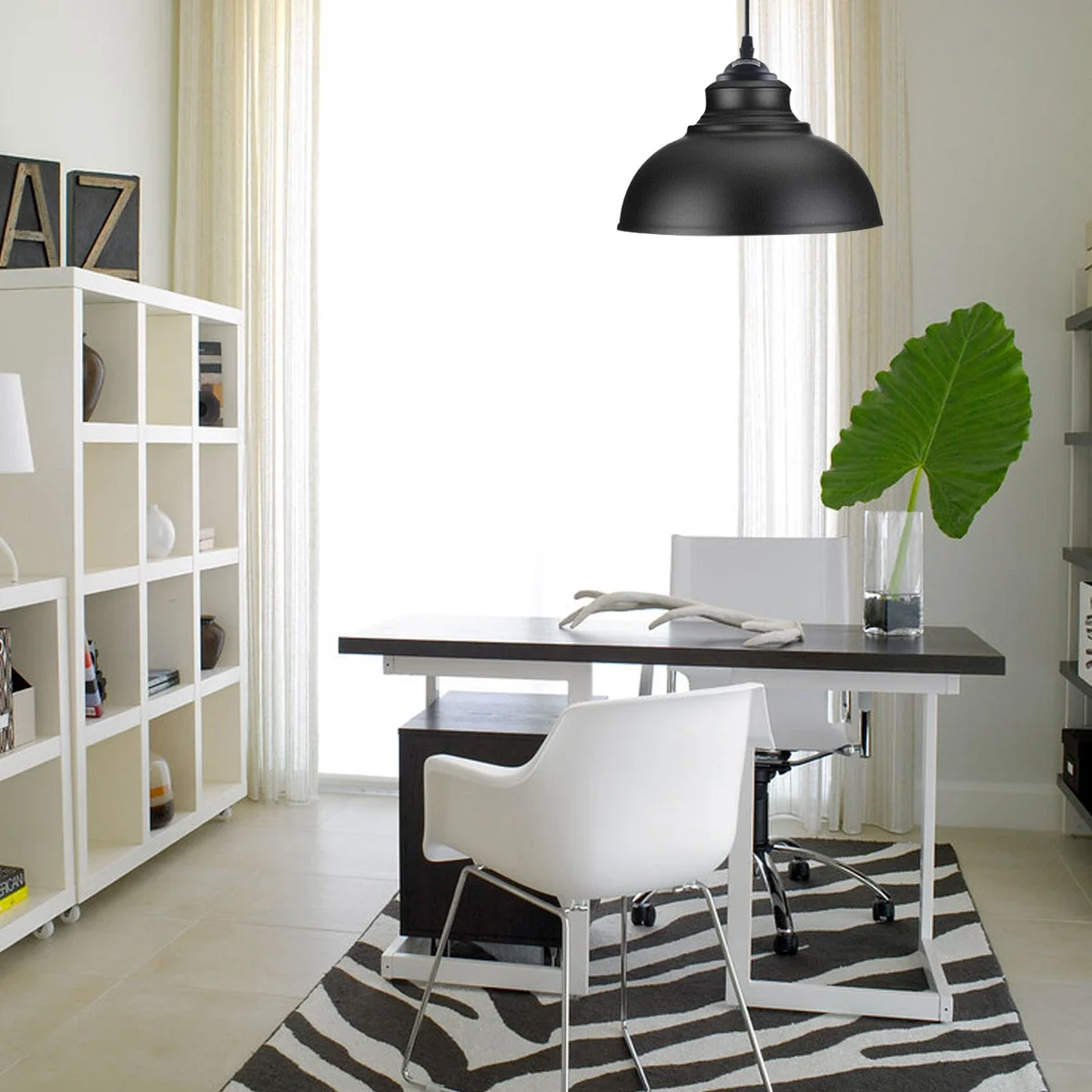 Black curvy pendant hanging light with metal body, PVC cable, round 10 cm ceiling plate, hanging from E27 lamp holder.