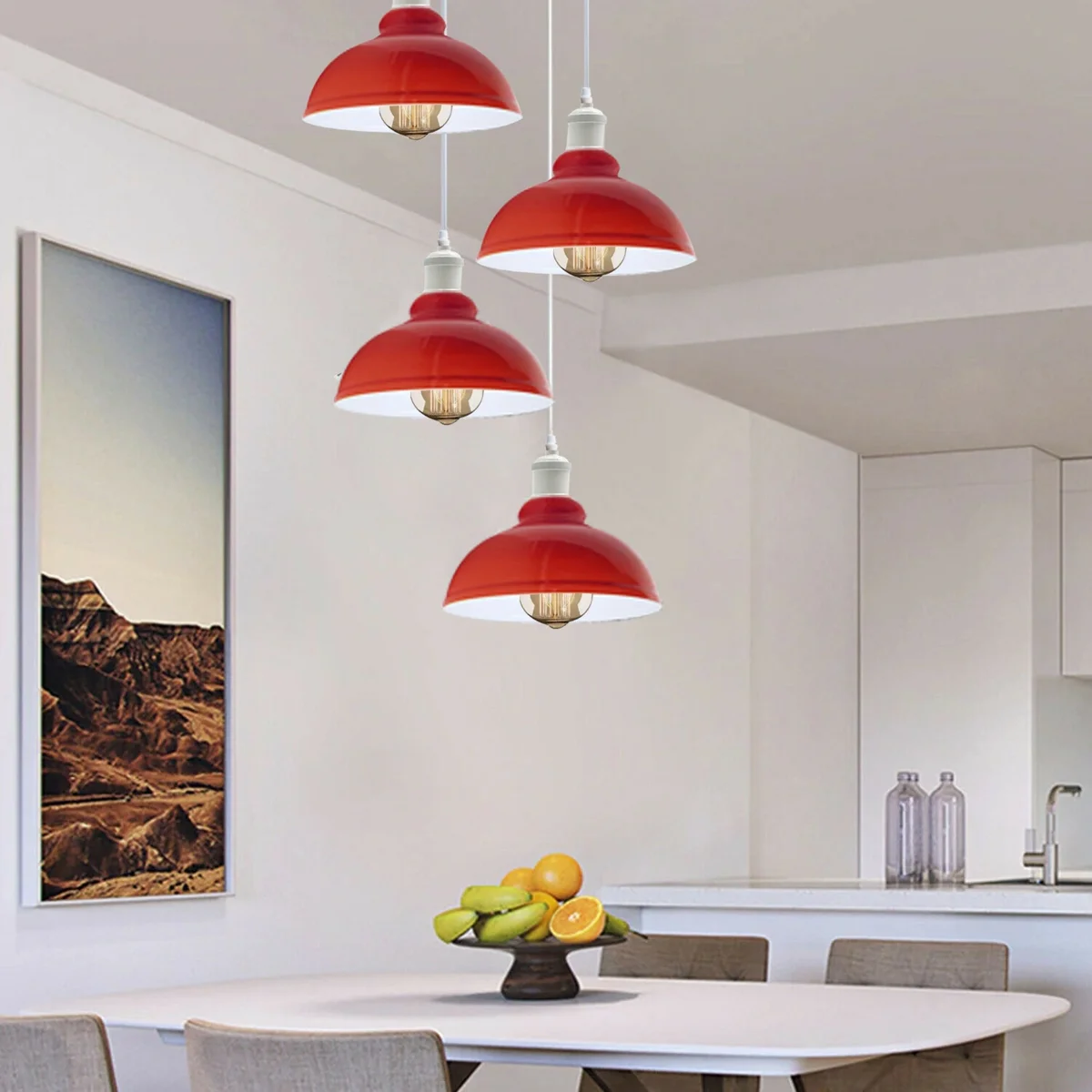 Red kitchen pendant light cluster with four curved metal shades, contrasting inner surfaces, hanging on PVC strip