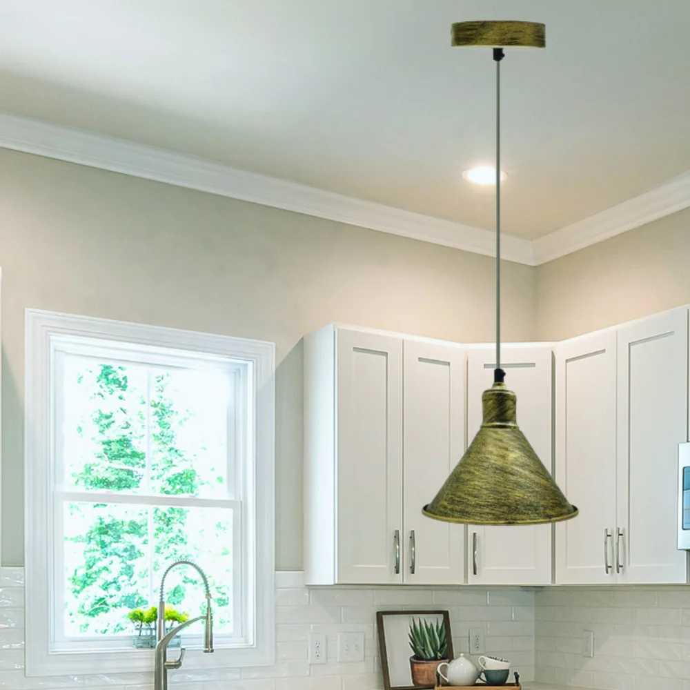 Industrial pendant light hanging on 95cm PVC cord, brushed brass metal body, 10cm diameter ceiling plate