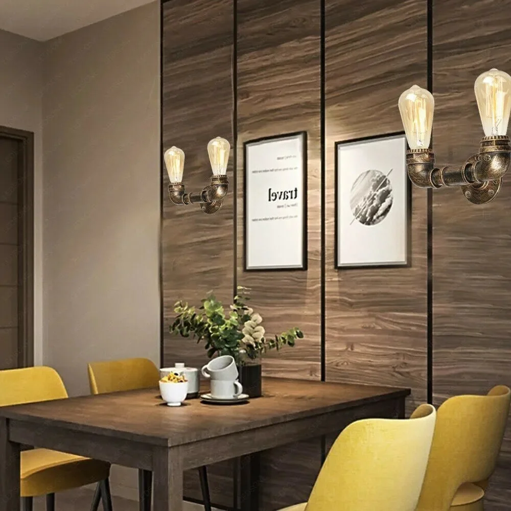 Industrial double B22 pipe light in brushed copper metal, featuring two lamp holders, vintage wall fixture style.