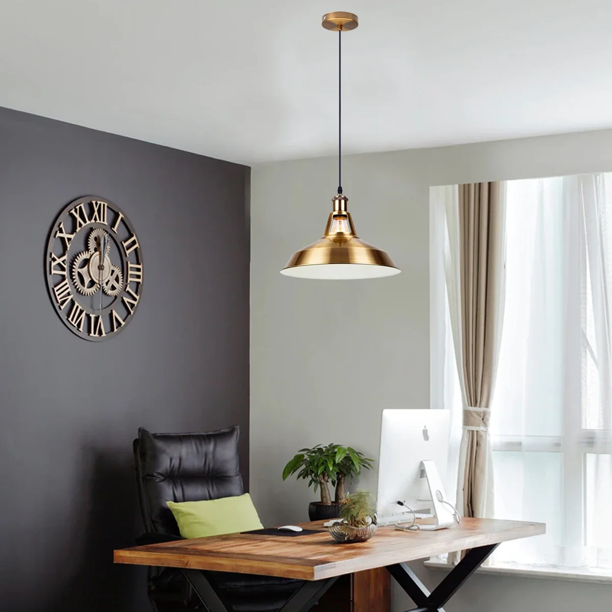 Dimmable industrial light in yellow brass pendant, hanging 95cm above a table, sleek metal finish.