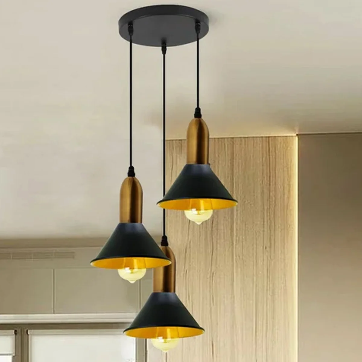 Black 3 hanging light shade with a metal body, a PVC cable, and three lighting holders.