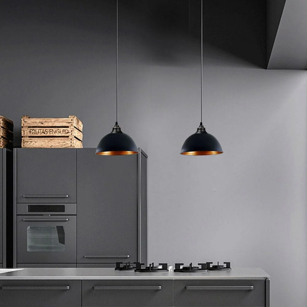 Modern iron pendant light in black, hanging from ceiling with a sleek curve, warm romantic glow, suited as a cafe pendant light
