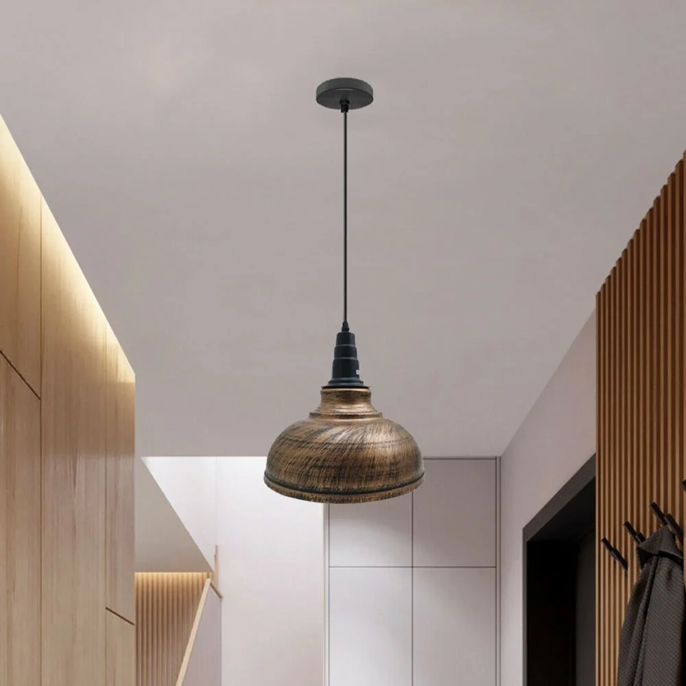Industrial pendant lighting with a black iron shade, white interior, brushed copper detail, 290mm diameter on E27 base.