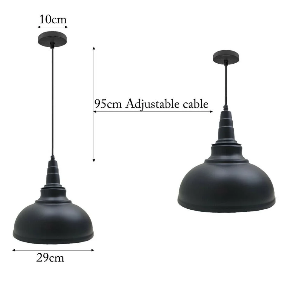 Industrial pendant lighting with black iron shade, white inner, brushed copper accents hanging from ceiling.