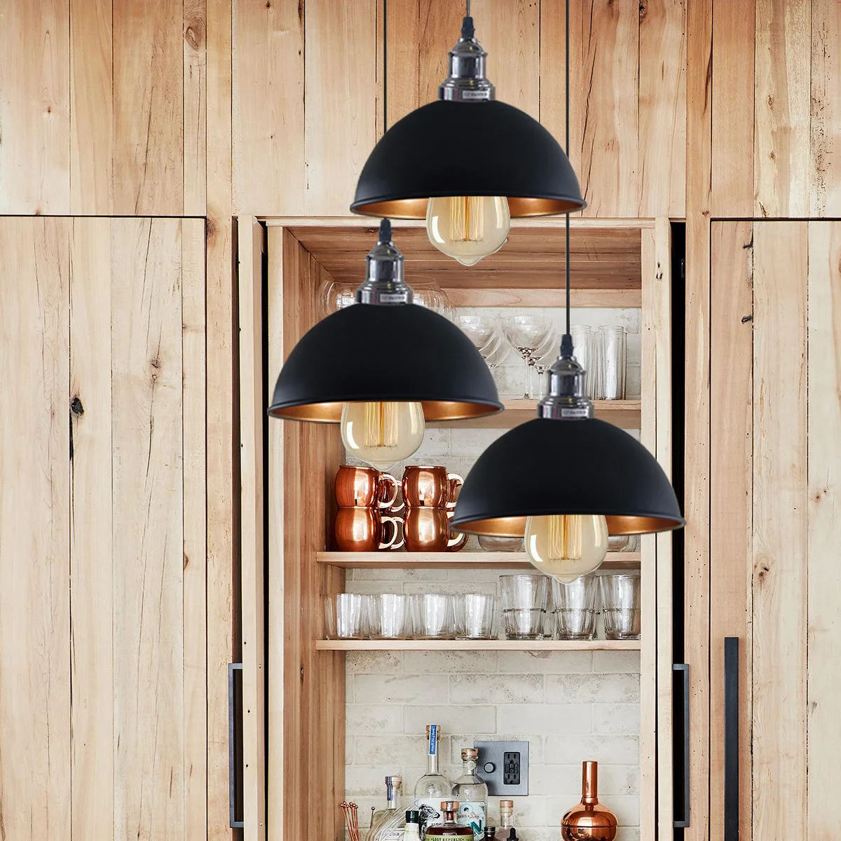 Industrial pendant light with 3 black metal bulbs, gold interior shade, brass socket accents, hanging 95cm