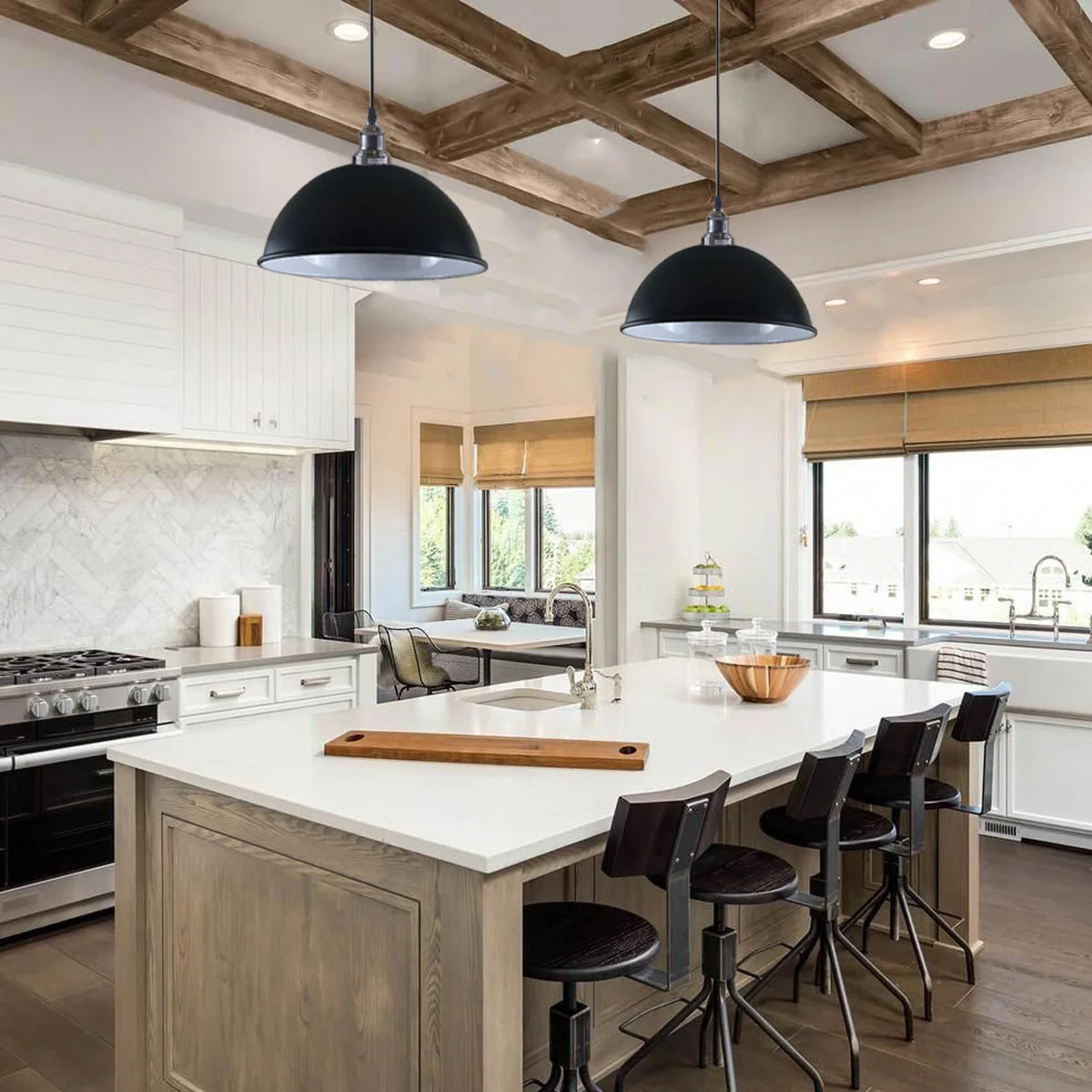 Black pendant light with glazed dome, brushed nickel frame and white interior, angled for sloped ceilings.