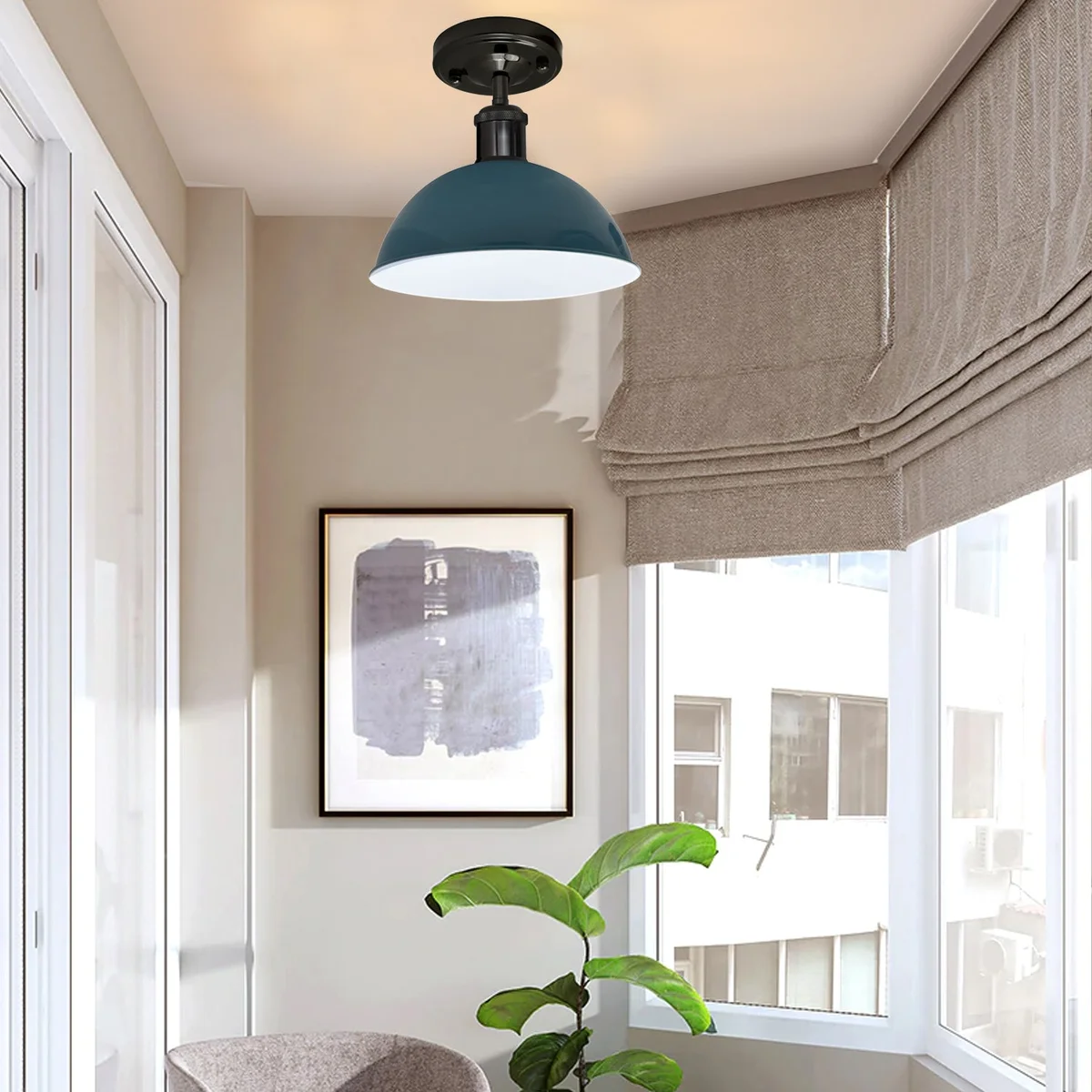Dome ceiling light in shiny black and blue metal shade with E27 base sits on a slender metal frame.