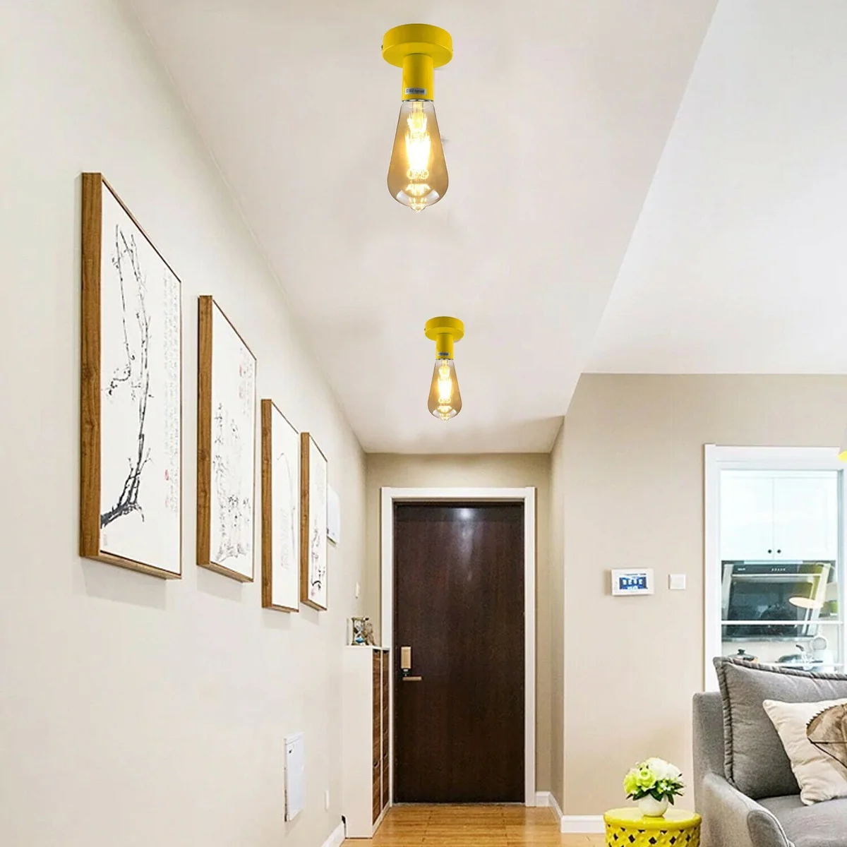 Yellow ceiling light with metal body and E27 base holder, 10cm wide, displayed upright on a fixture.