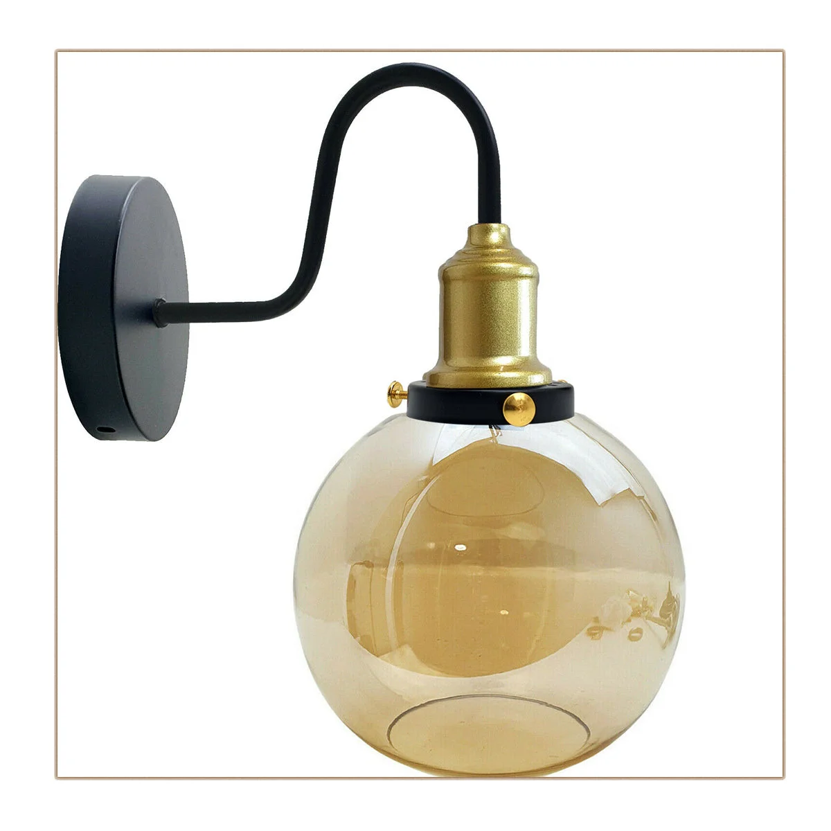 Amber glass shade lamp with glass globe on metal base, wall-mounted fixture for living rooms or offices.