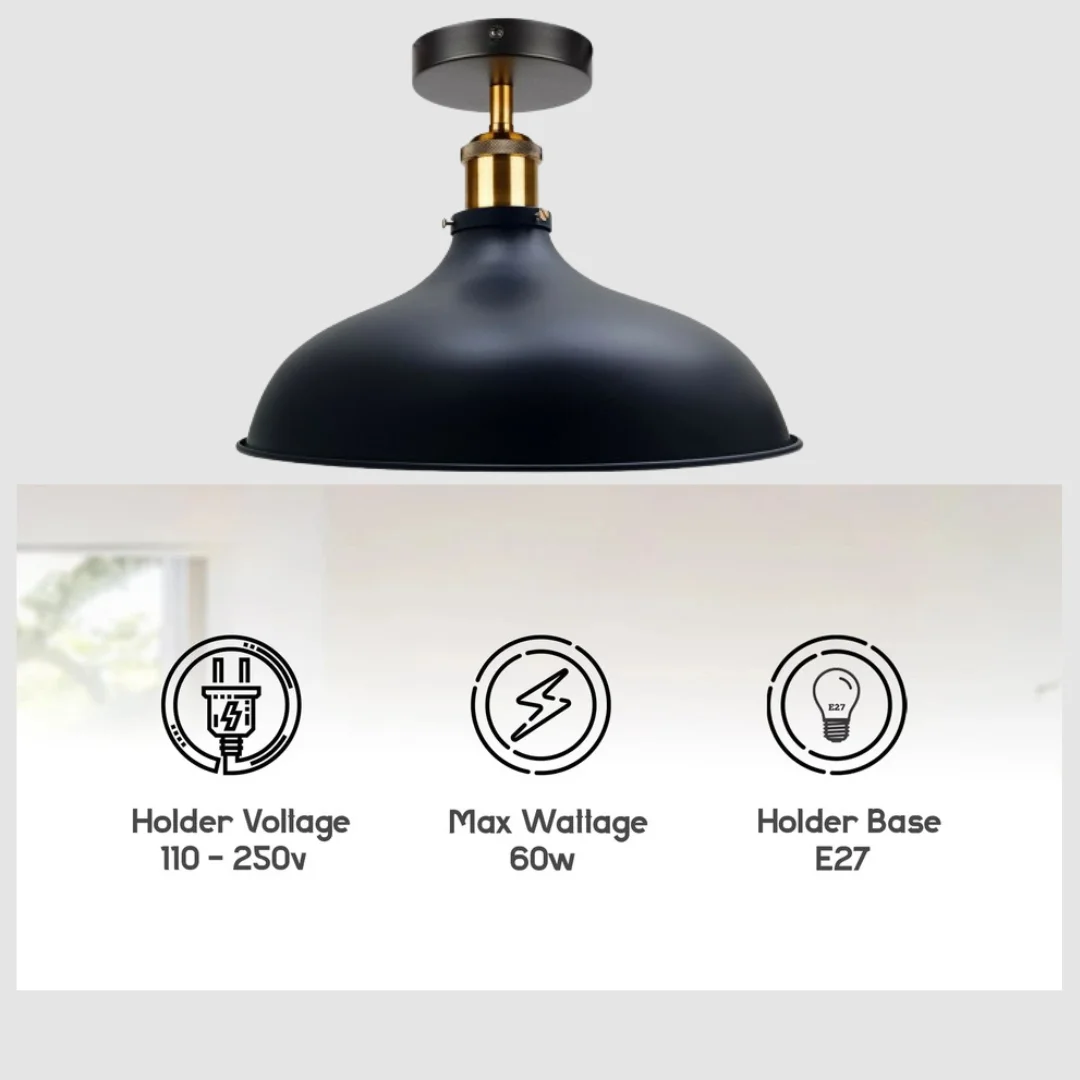 Black vintage industrial pendant light with matte metal shade and brass accents, hanging from a ceiling rose.
