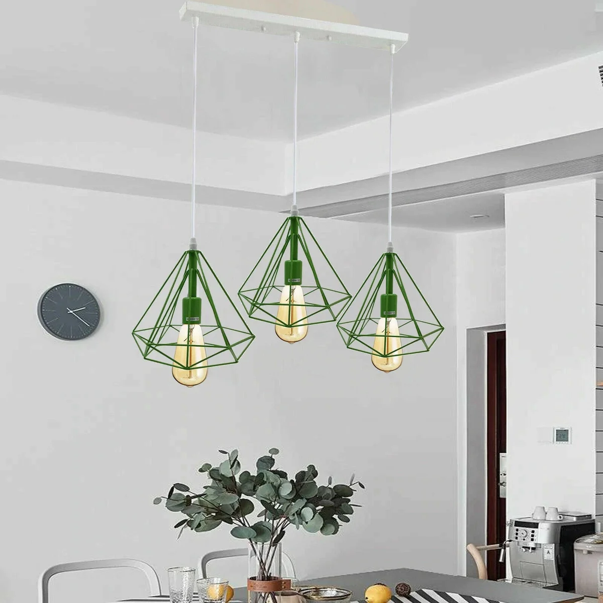 green cage ceiling light hanging as a pendant with Edison-style bulb, metal frame, suitable for kitchen