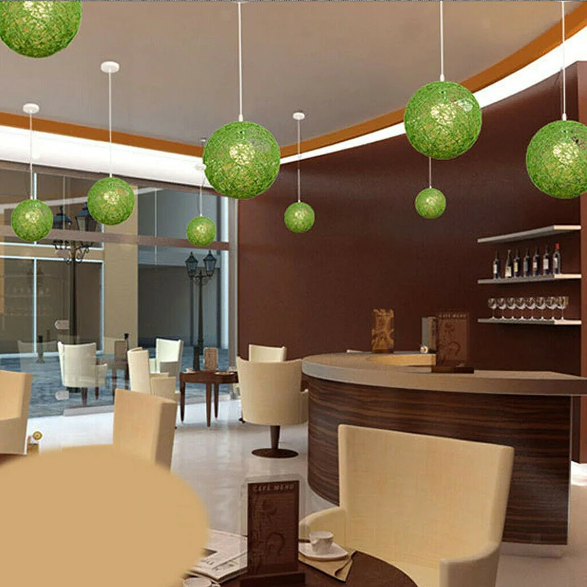 Green rattan pendant lamp with woven wicker shade around an E27 socket, 20 cm diameter, iron frame and 95 cm hanging wire.