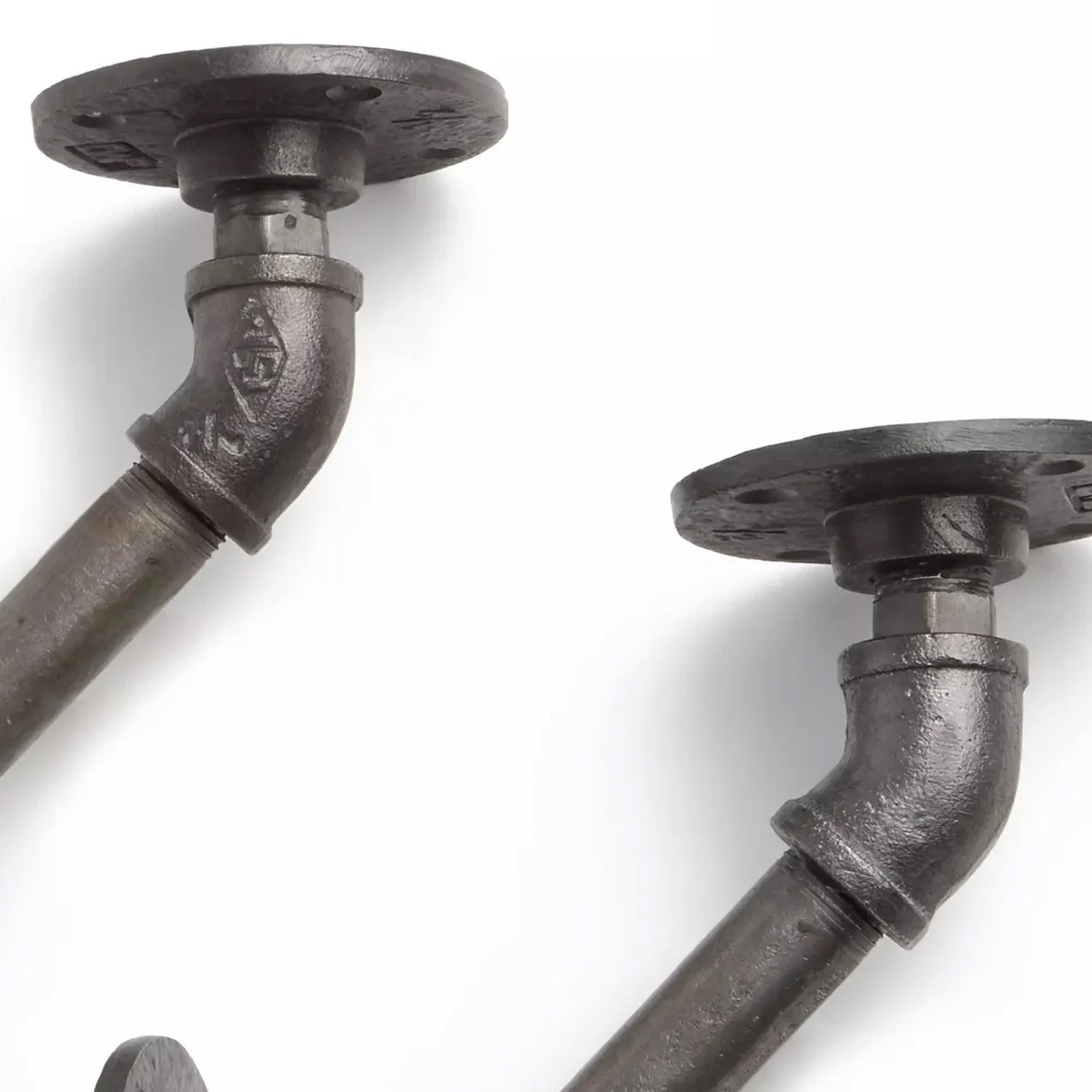 Black 3/4 inch elbow joint made of malleable iron with 45-degree angle and threaded ends for pipe fittings