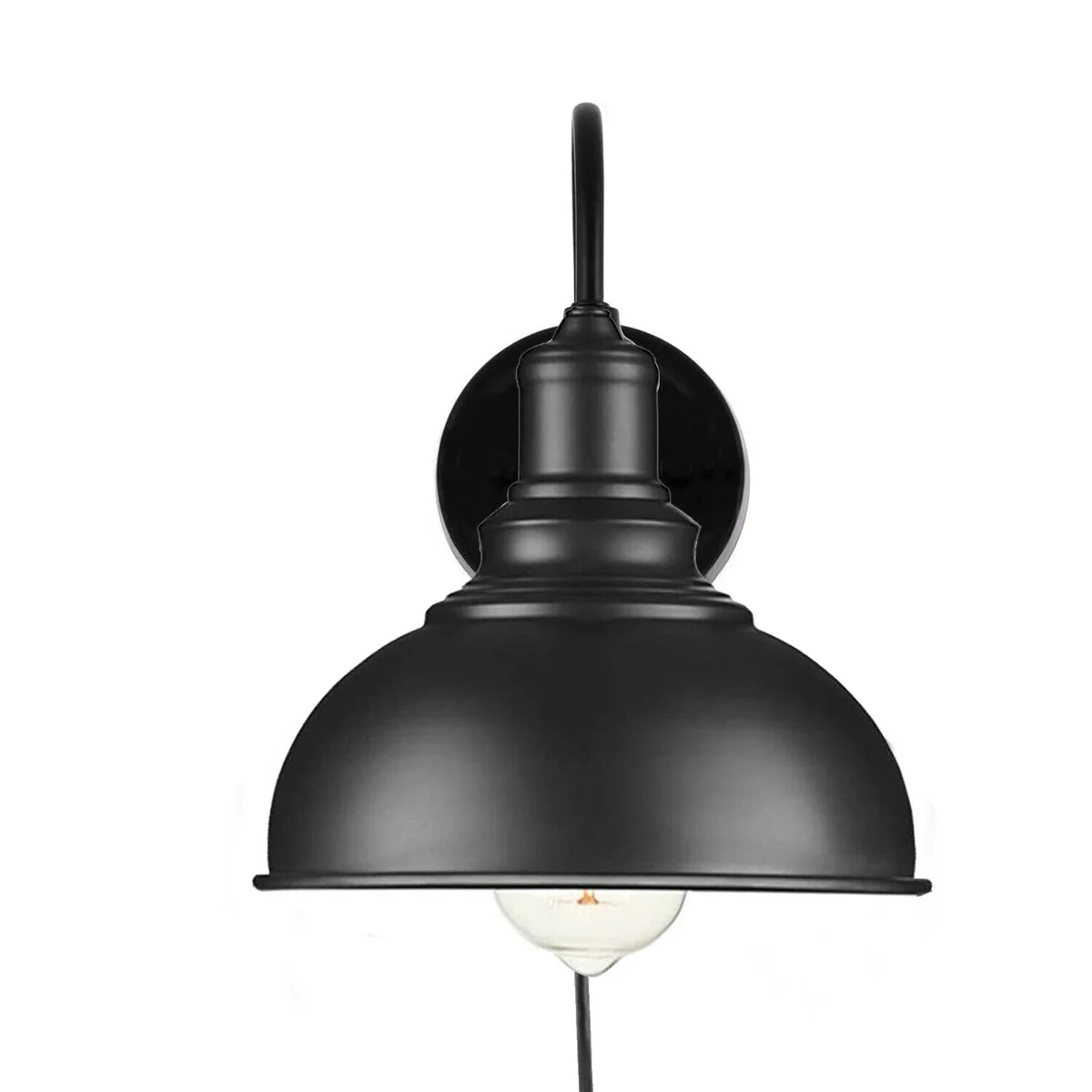 Black metal indoor wall light with plug-in cable and dimmer switch mounted on a white wall near a wooden desk