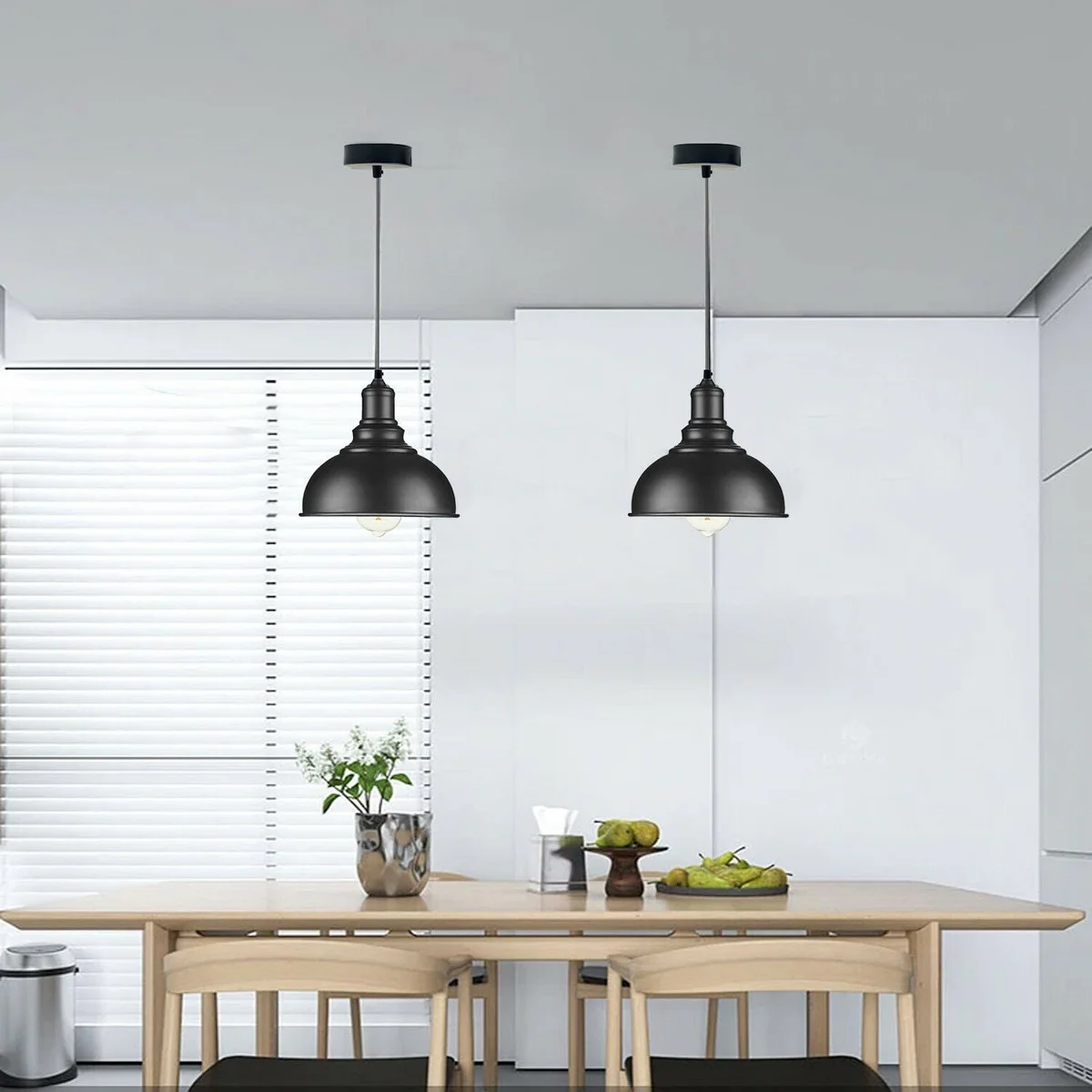 Black metal dome industrial style pendant light with cage design and 95cm adjustable flex cable hanging from ceiling rose