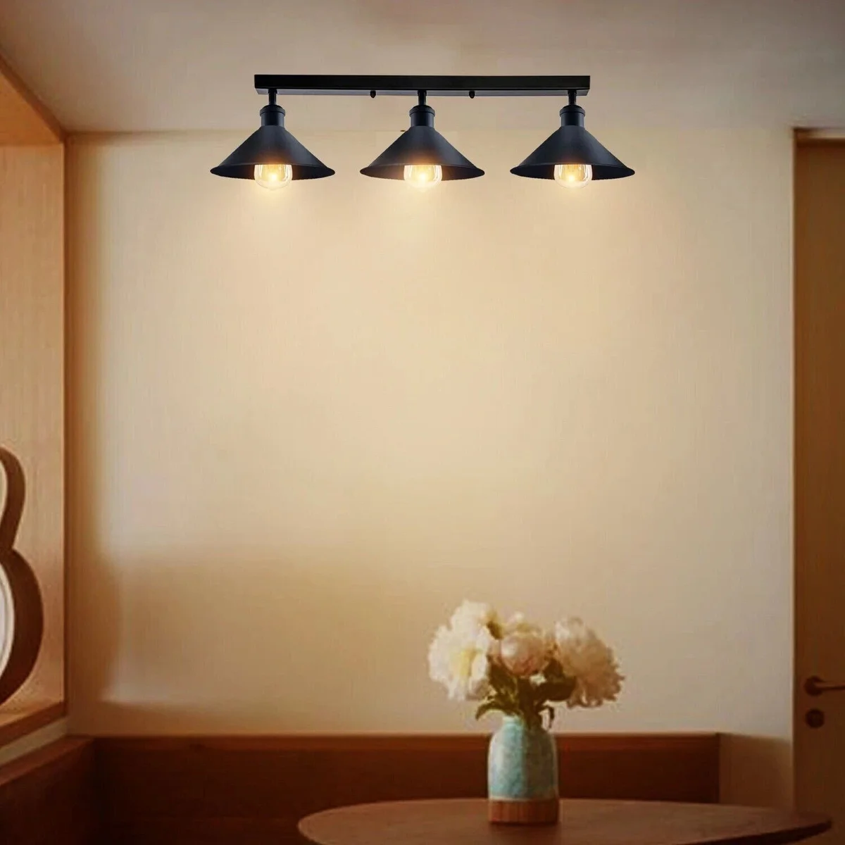 Three-head dimmable ceiling light with rustic red metal shades and brushed silver fittings mounted on ceiling rose