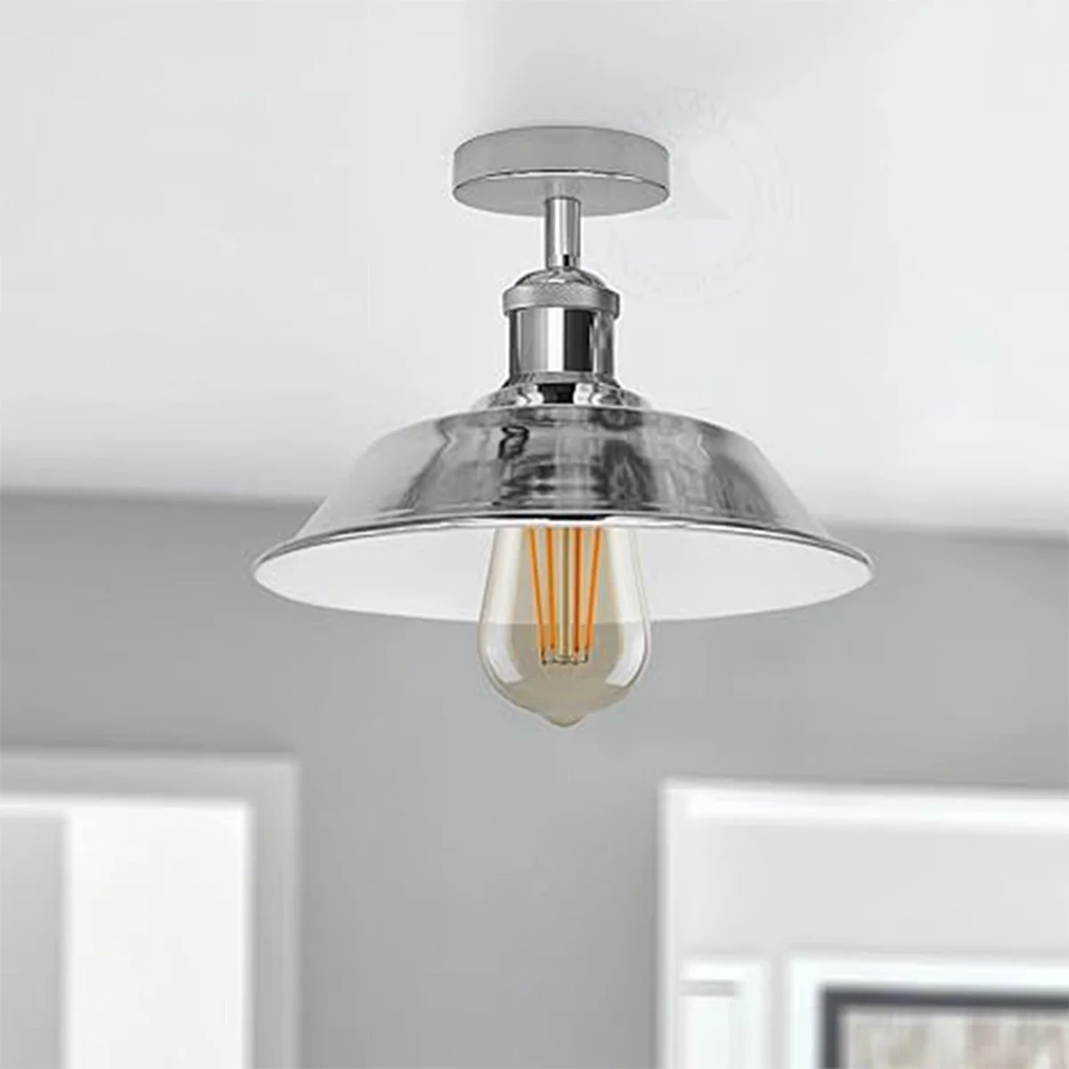 Chrome bowl-shaped modern industrial ceiling light with metal finish, semi-flush mount and E27 bulb holder visible