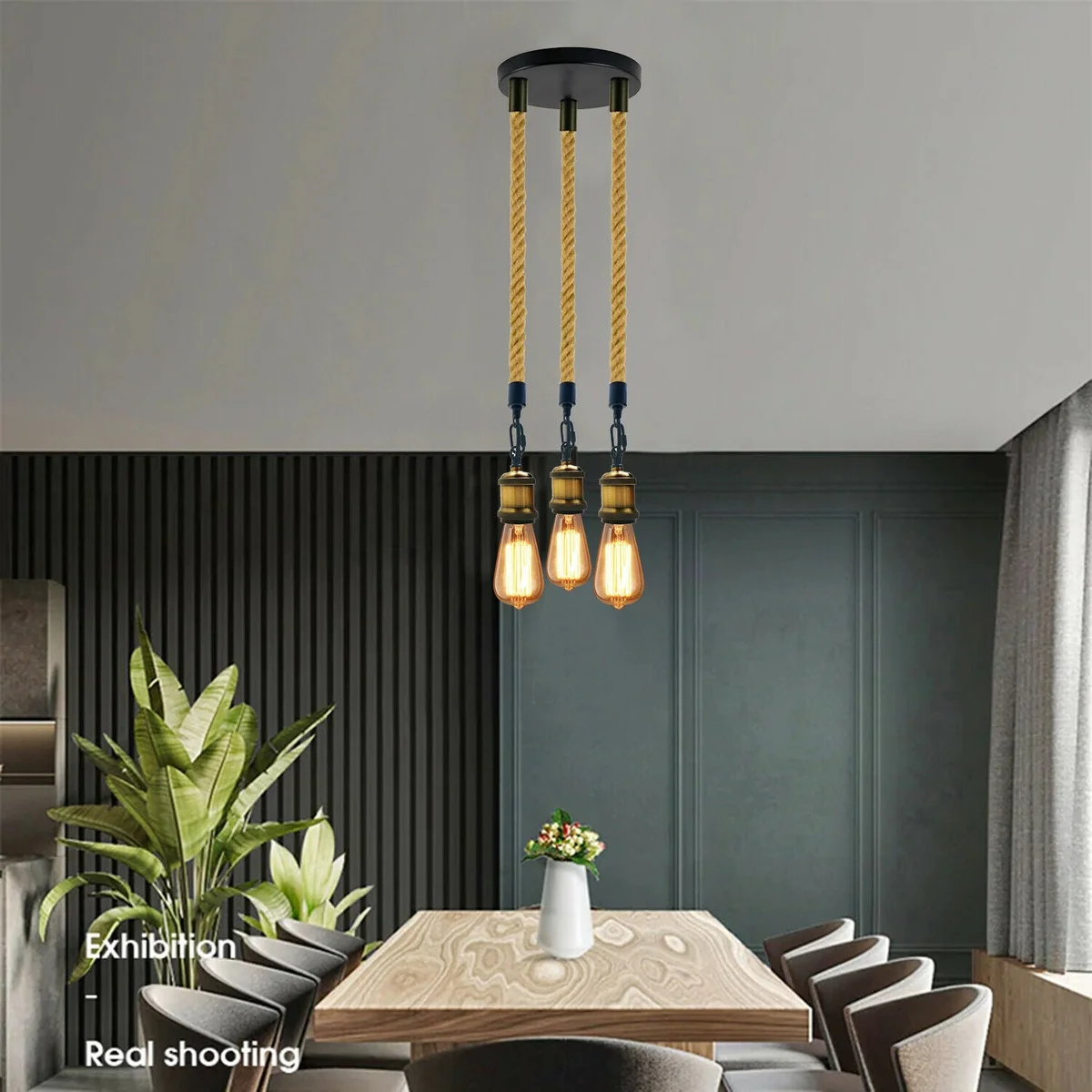 Vintage style hemp rope pendant light with three bulbs hanging from natural hemp ropes and metal fixtures