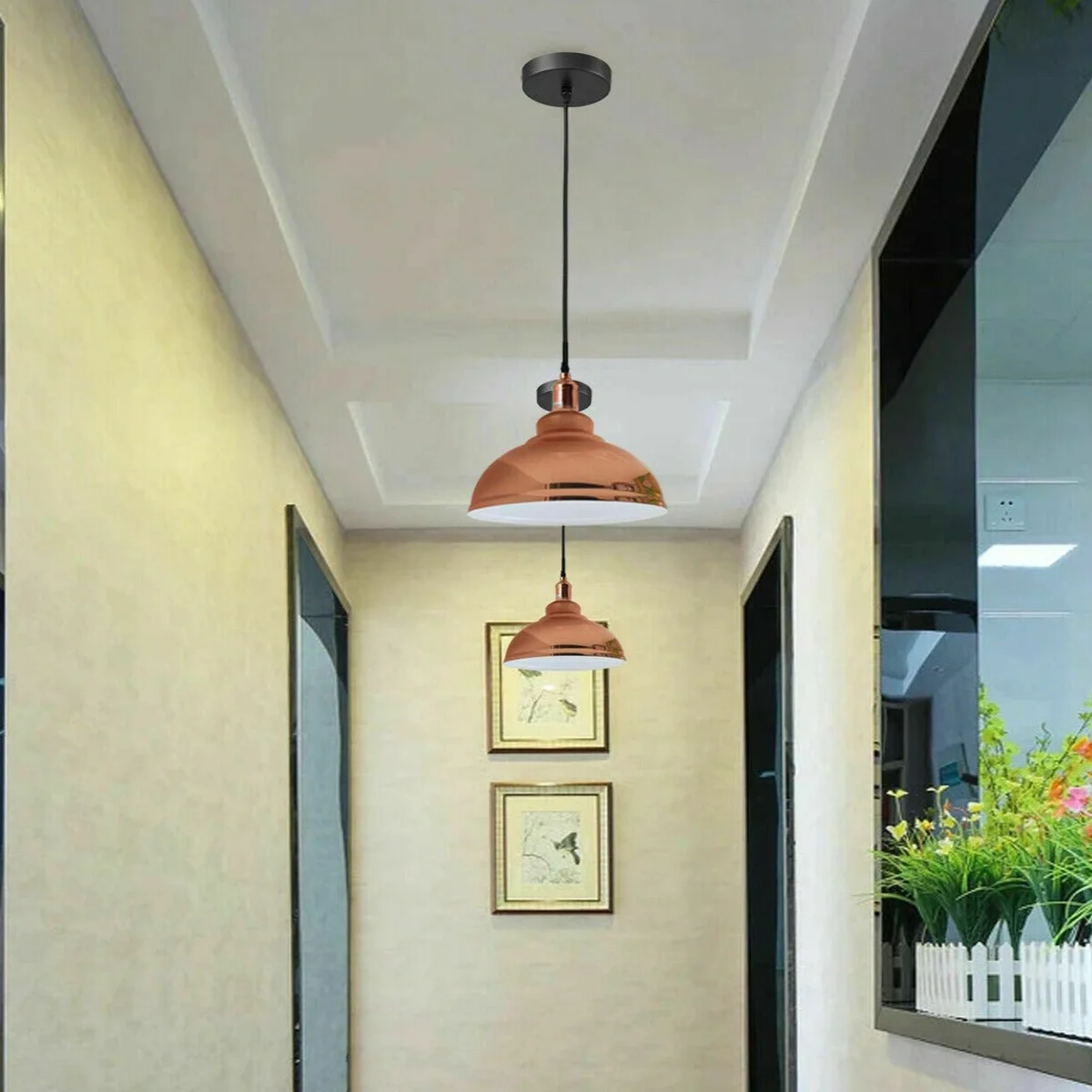 Rose gold pendant light with sleek dome shade, white interior, and adjustable E27 base hanging from ceiling cable