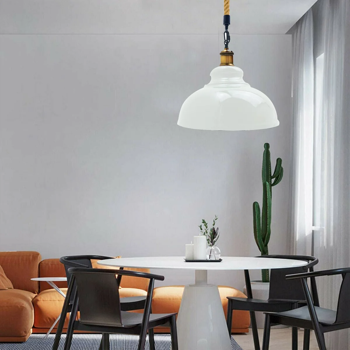 White metal pendant light with hemp rope and retro barn style shade hanging against a white background