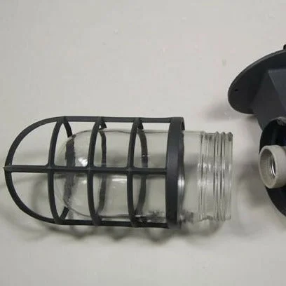 Twin pack industrial vintage metal cage wall lights with glass shades, ideal compact bedside light for reading nooks