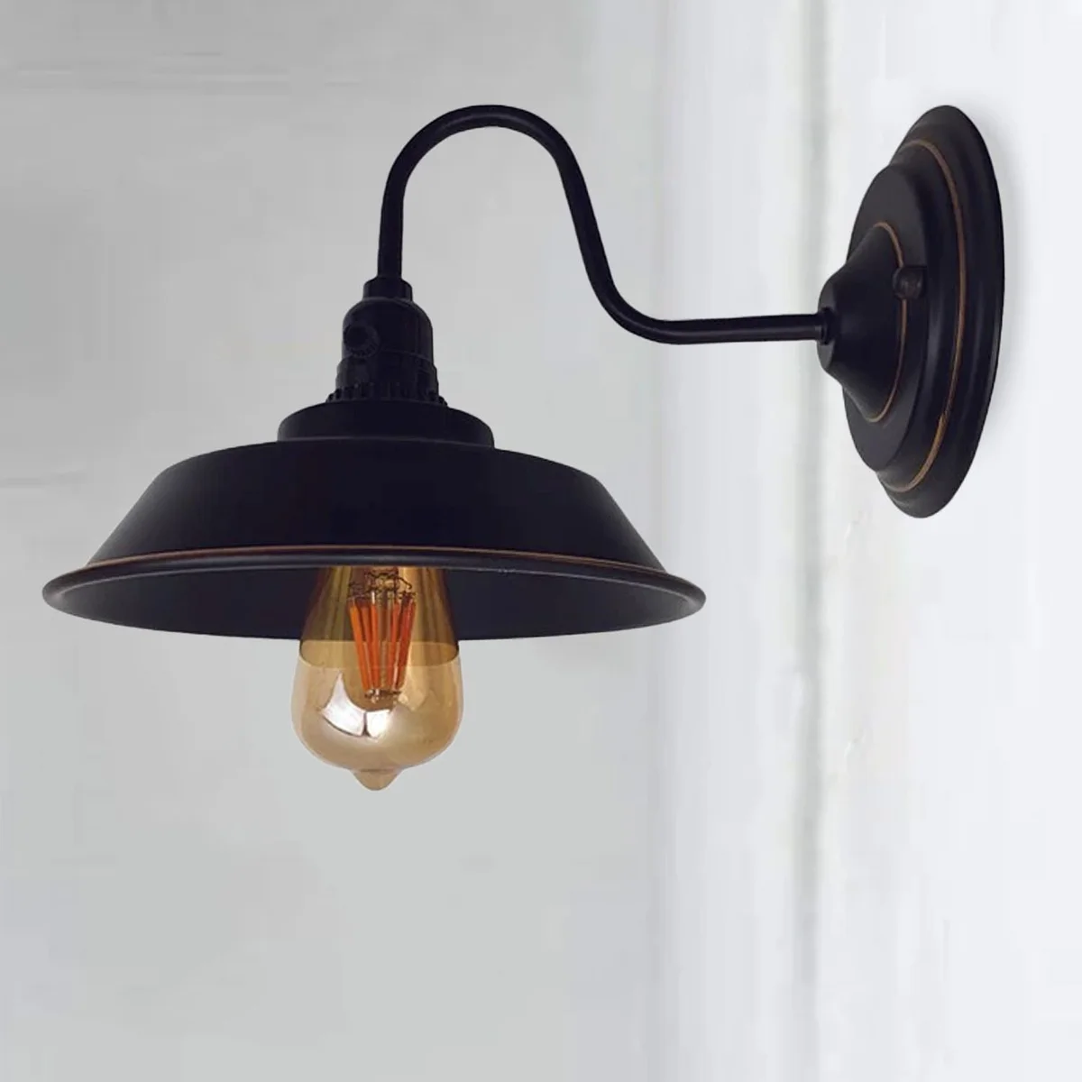 Black and gold modern wall sconce with metal cage, designed for E27 socket and rustic elegance