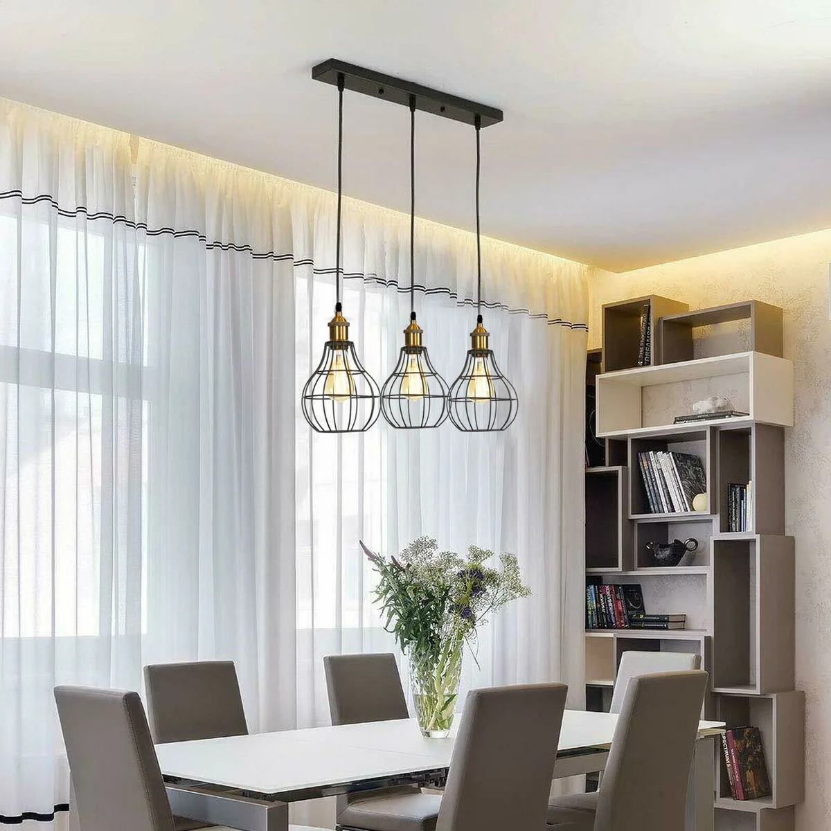 Black modern industrial wire cage pendant light with three exposed bulbs and 95cm cables hanging from ceiling plate
