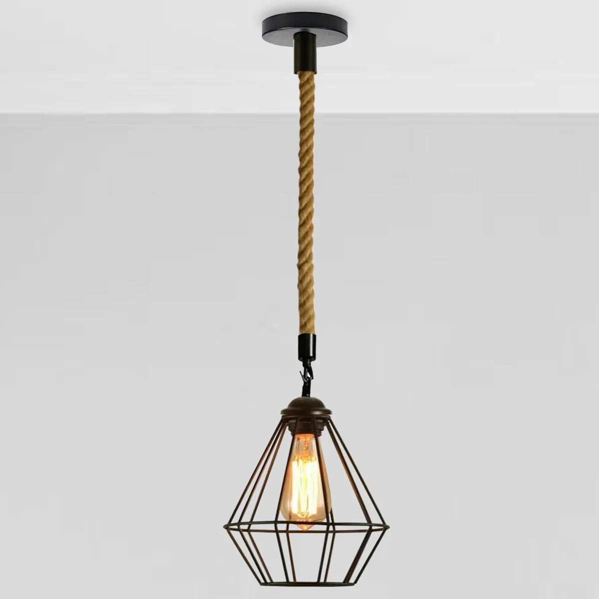 Black industrial pendant light with retro cage and hemp rope hanging from ceiling mount, E27 bulb holder visible