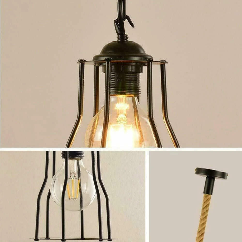 Black industrial pendant light with retro cage and hemp rope hanging from ceiling mount against white background
