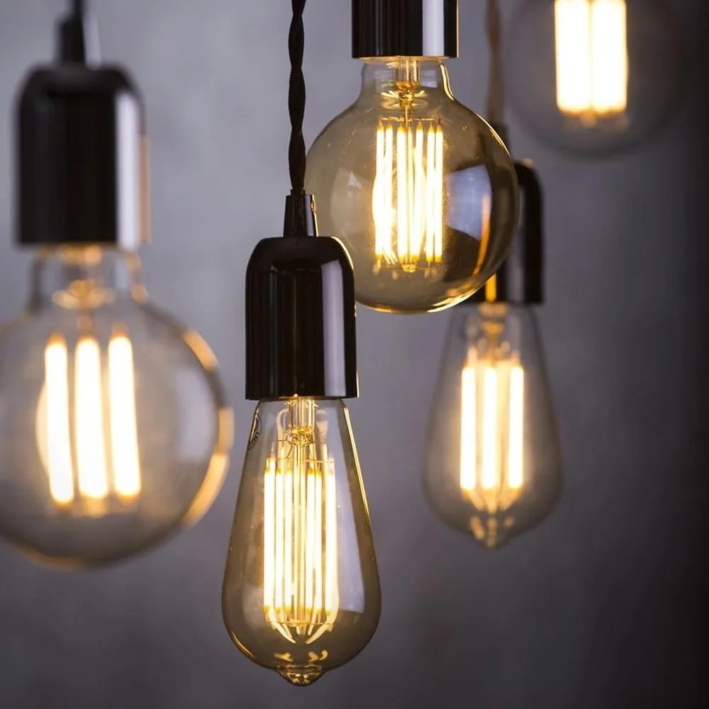 Black vintage pendant light with metal finish, single E27 socket, black twisted cord, and ceiling rose for indoor use