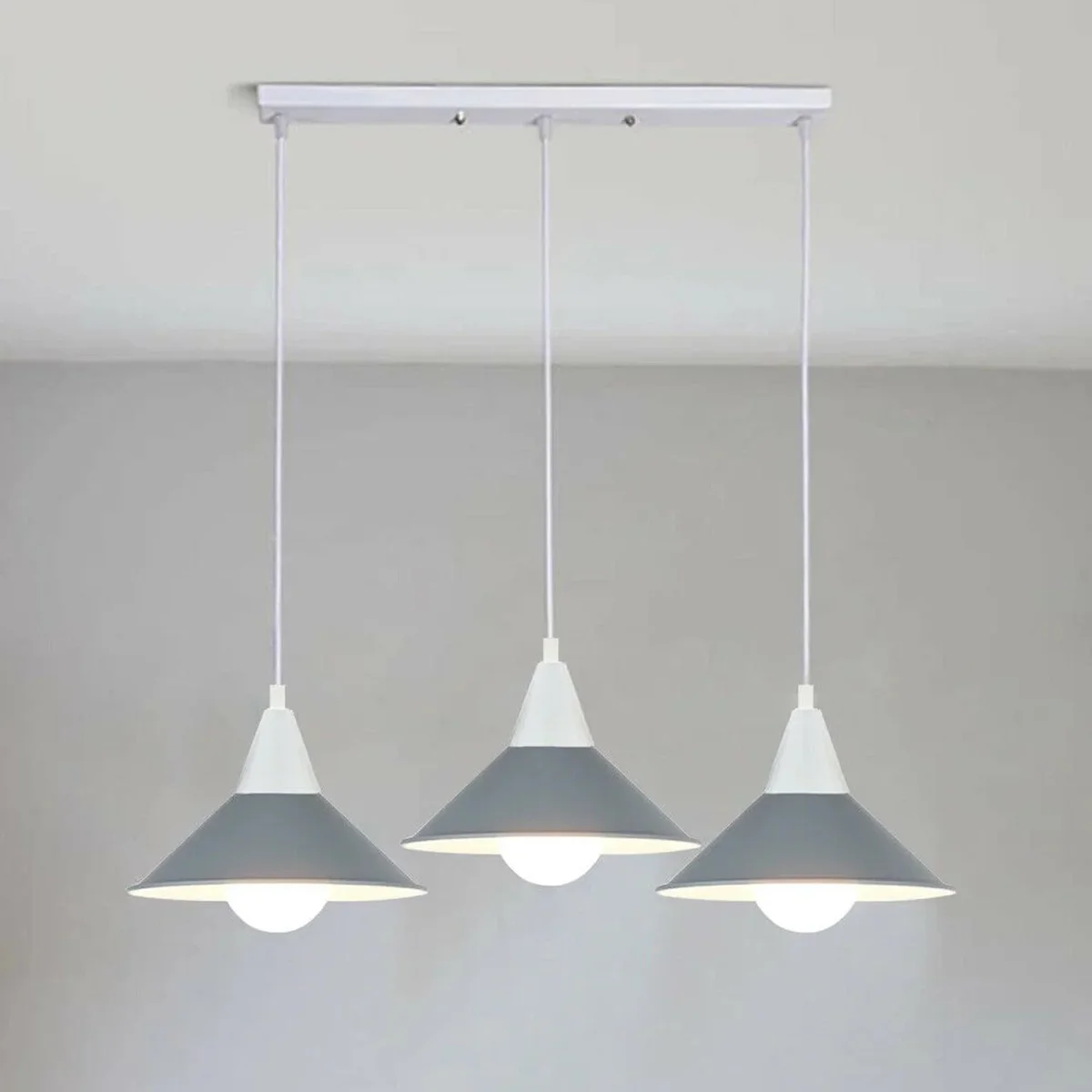 Black 3 head modern chandelier pendant light with metal and PVC shades hanging from ceiling plate