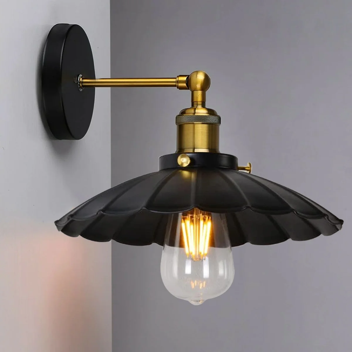 Modern black wall lights with matte metal finish and minimalist shade, suitable for indoor use with E27 bulbs
