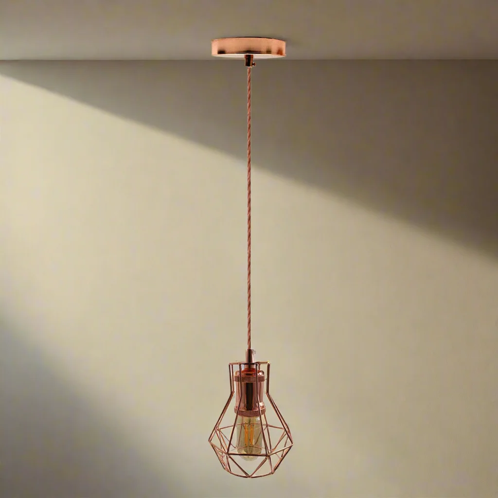 Vintage style lamp holder in polished rose gold with E27 fitting and 1-meter cord, ideal for pendant lighting setups