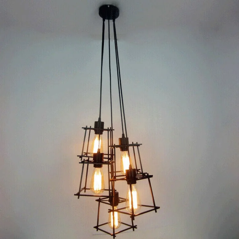 Black vintage industrial ceiling light with five metal cage pendant lamps hanging from ceiling plate