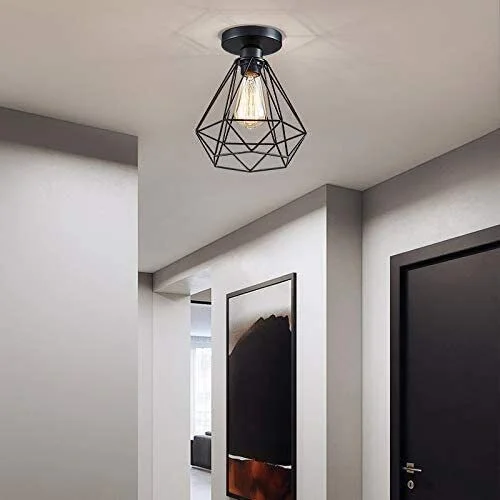 Black metal pendant lamp with vintage Edison bulb and cage design, ideal for hallway or dining room lighting