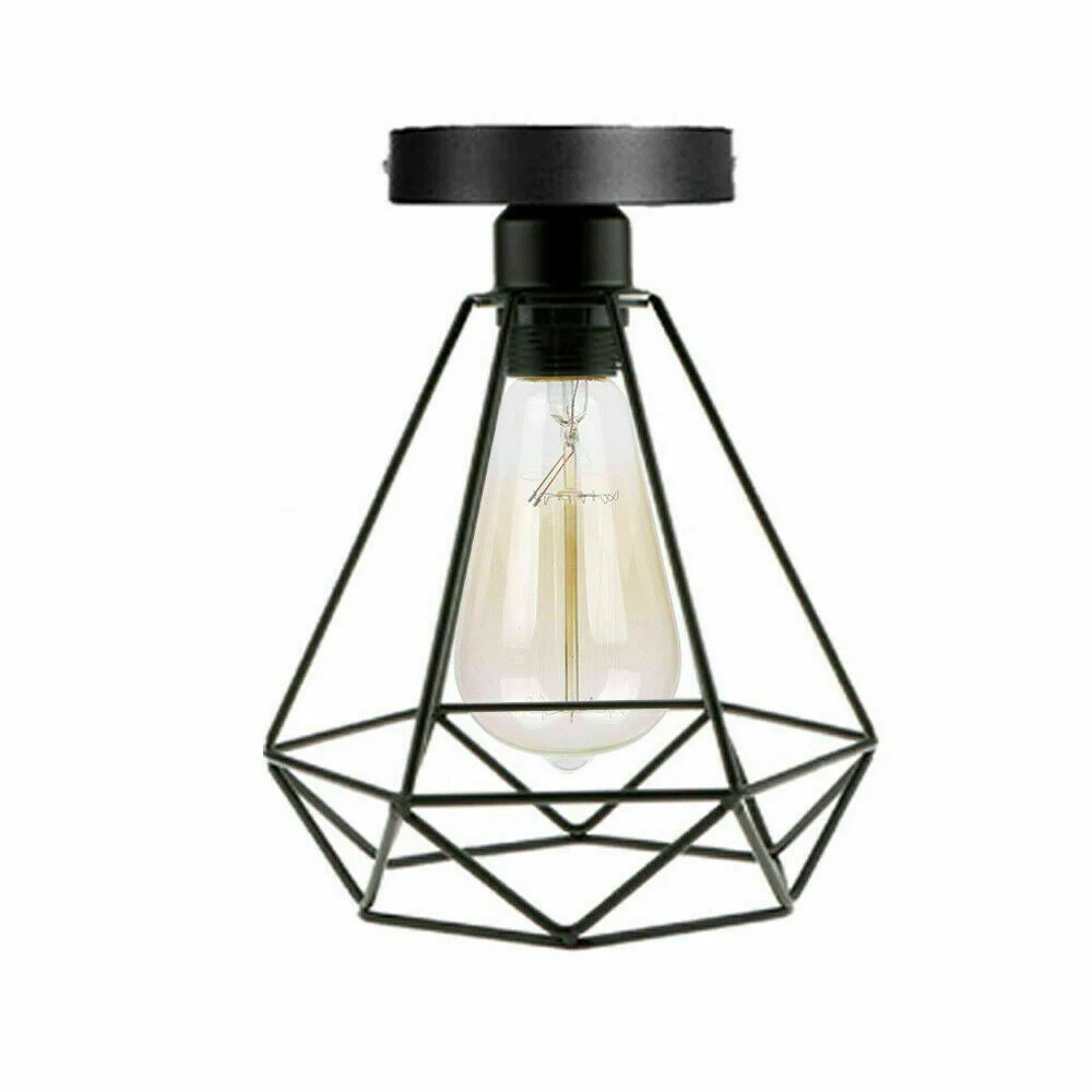 Black vintage industrial lamp with metal cage and incandescent ST64 E27 bulb, flush mount ceiling pendant style